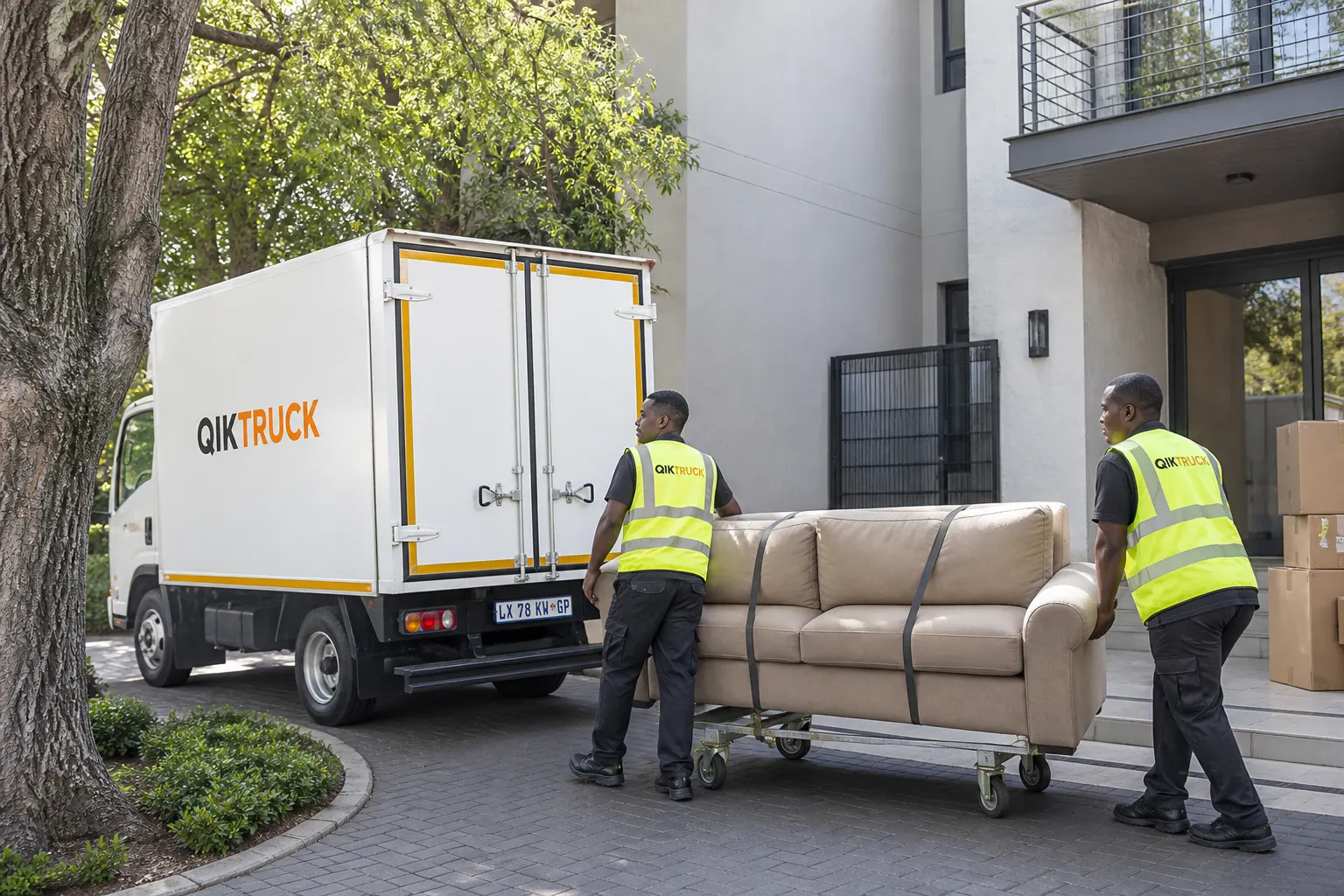 QikTruck 4-ton house move at a Sandton townhouse with a sofa on a trolley